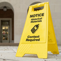 A photo illustration of a small easel-style sign typically used to warn of wet floors in front of King Library. The sign reads: Notice. Historical Materials. Context Required. The sign also has an icon of a tag on it.